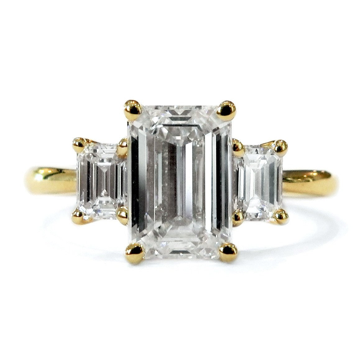 Unique Emerald Cut Diamond Trilogy Engagement Rings For Women - Abelini